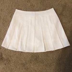 White pleated skort